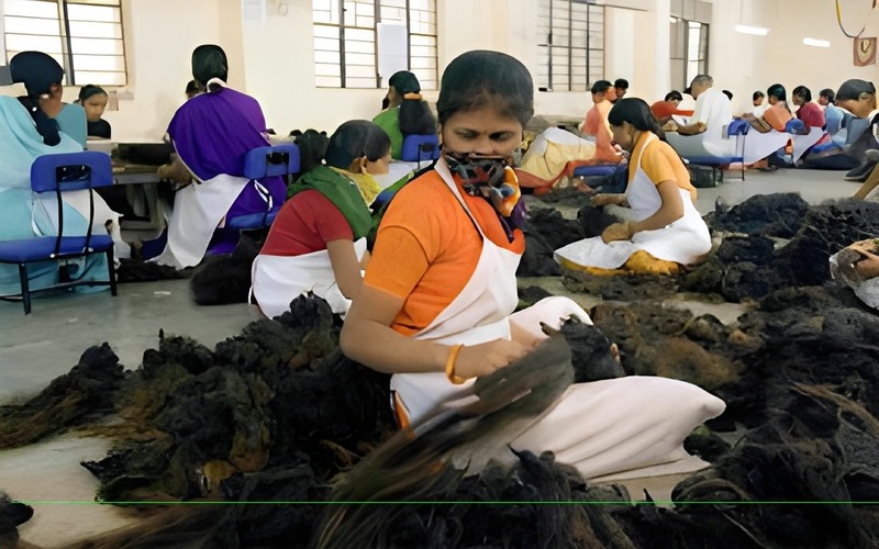 Temple workers processing donated hair